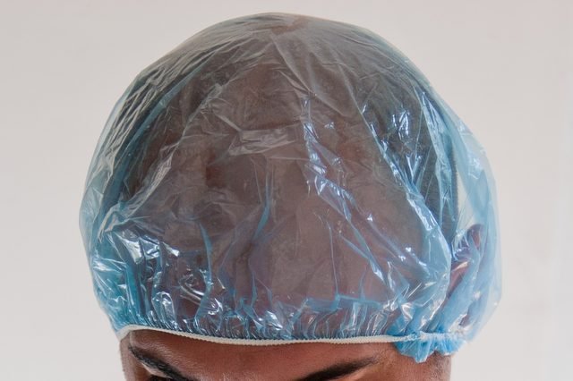 Cover your head with a plastic shower cap